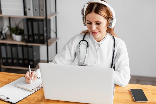 A doctor Doing Medical Transcription